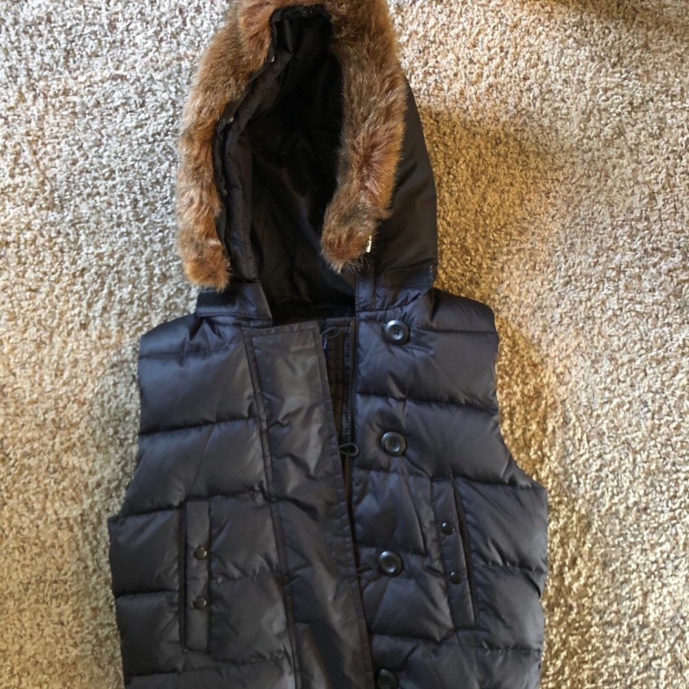 Gap Puffy Vest with removable fuzzy liner.